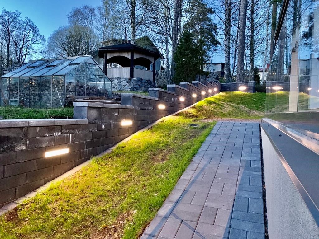 Led strip lighting on a wall is a functional courtyard lighting. With a recessed aluminium rail that opens downwards and a 7.2W-m LED strip, copyright LedStore